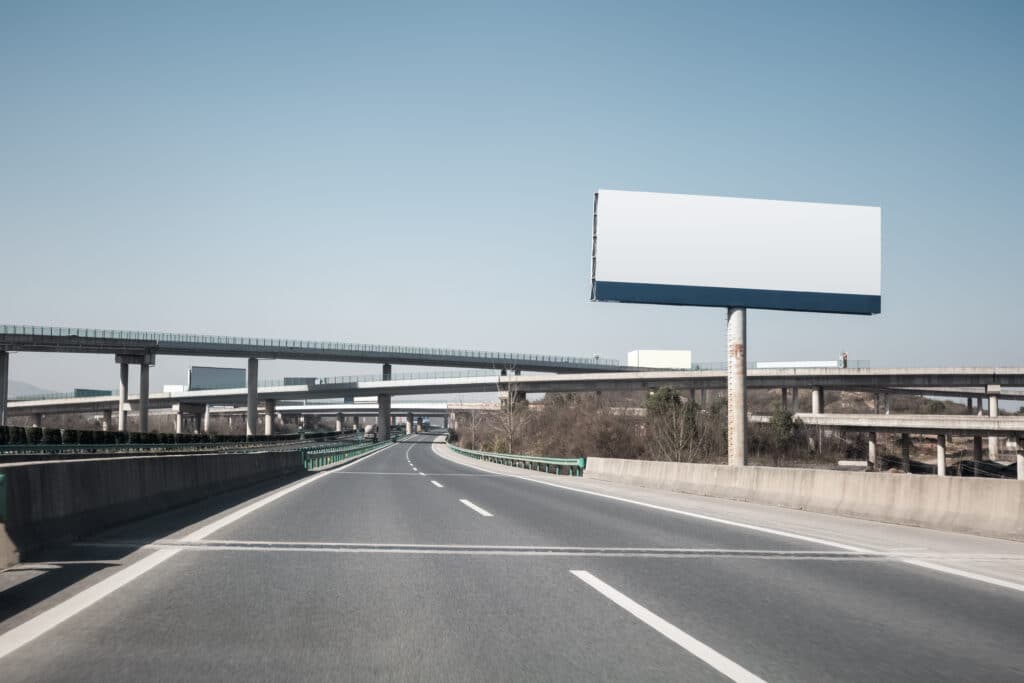 large billboards near the highway transportation hub