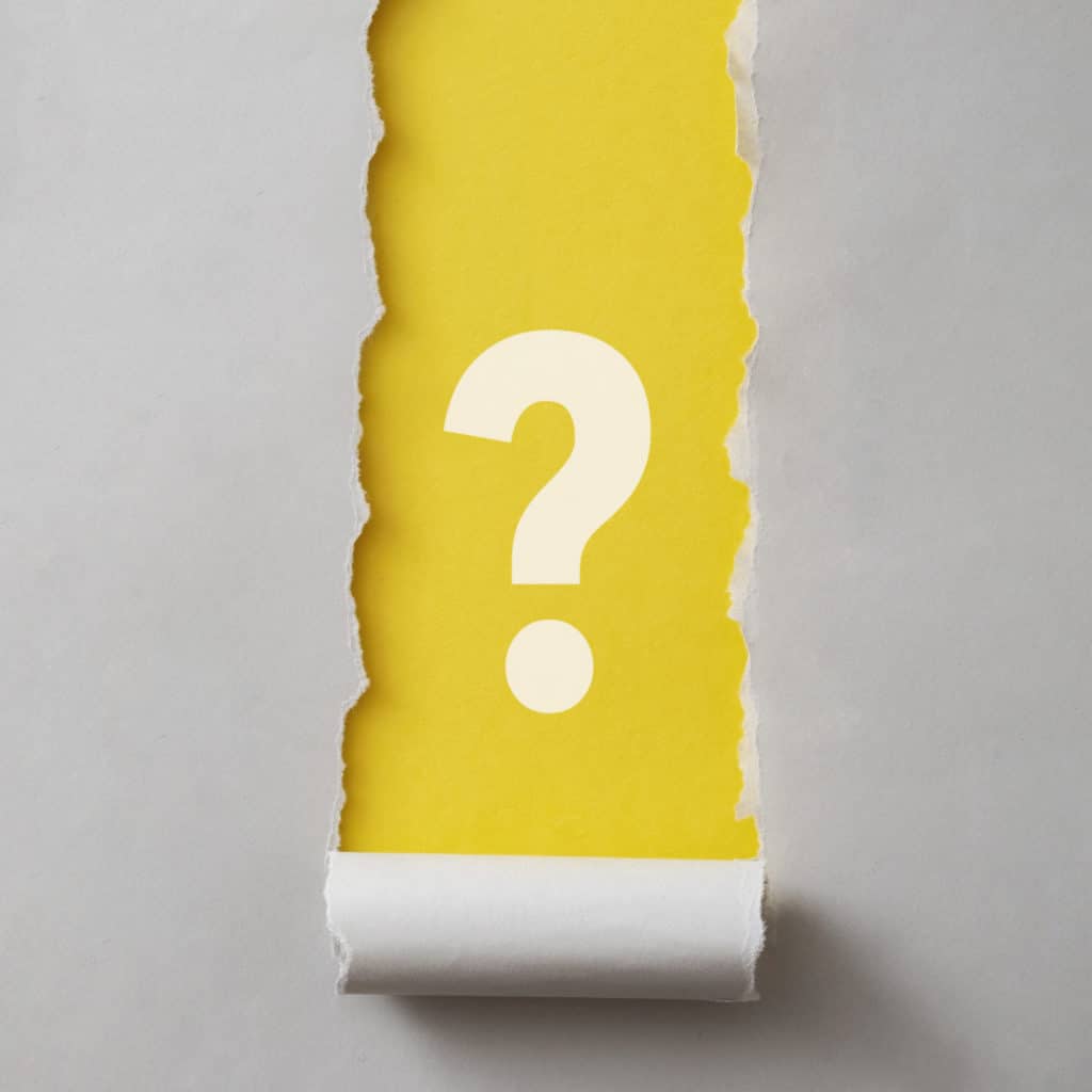 Colorful vivid yellow banner with question mark framed by torn grey paper neatly rolled to the bottom and copy space